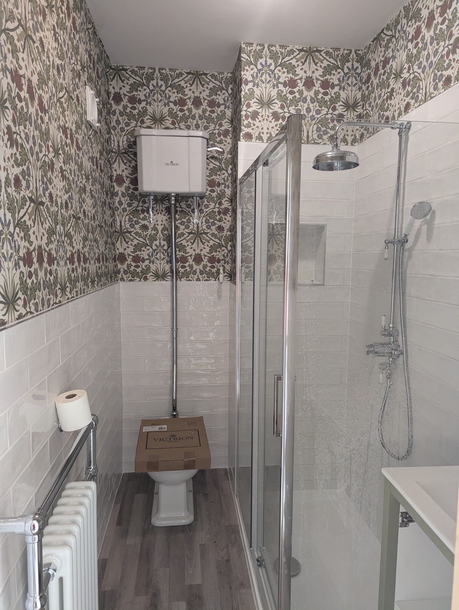 small bathroom, shower, high level cistern