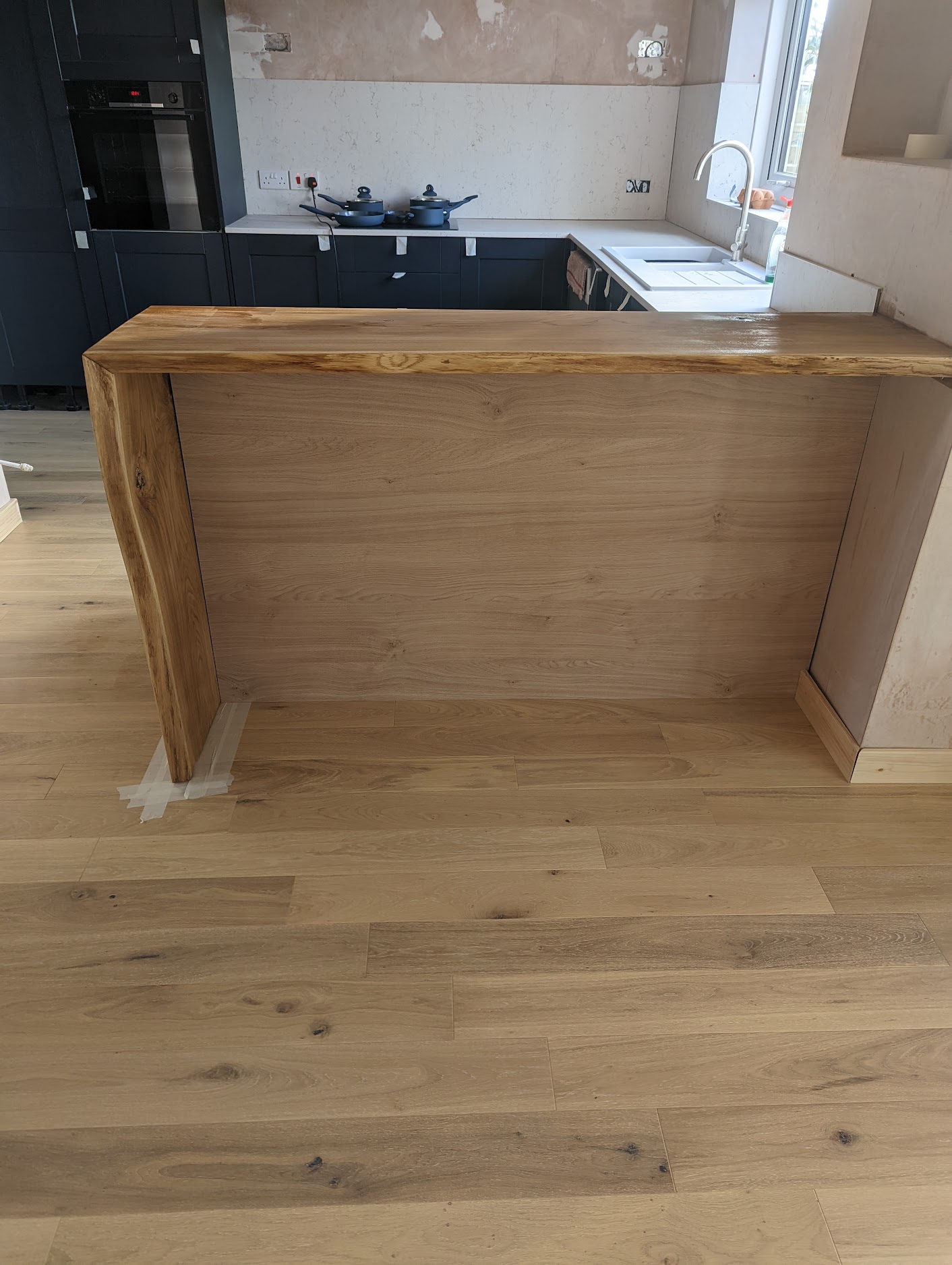 Oak worktop installation Sedgefield, breakfast bar, custom kitchen design Durham, supporting wall removal